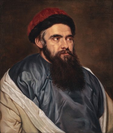 Porträt eines Mannes mit langen, dunklen Haaren und einem dichten Bart. Er trägt eine blaue Tunika und einen roten Hut. Der Hintergrund ist neutral und unterstützt den fokus auf die Gesichtszüge und den Ausdruck des Mannes.