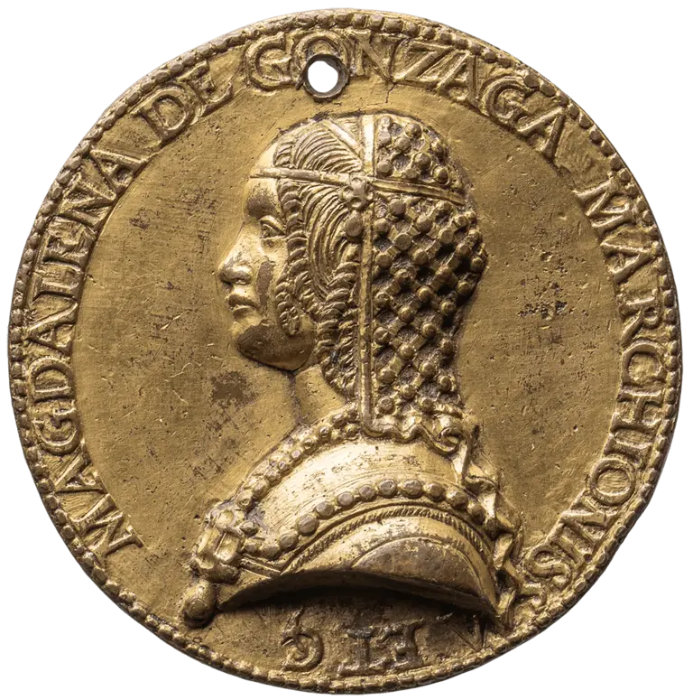 A bronze medallion featuring a profile portrait of a woman with intricately styled hair. She wears a decorative necklace, and her name,