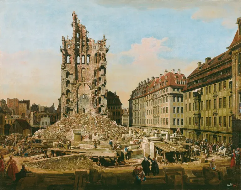 A historical scene depicting a ruined tower amidst rubble and debris, with damaged buildings surrounding it. People can be seen in the foreground, some working or observing. The sky is clear, suggesting a calm day despite the destruction.