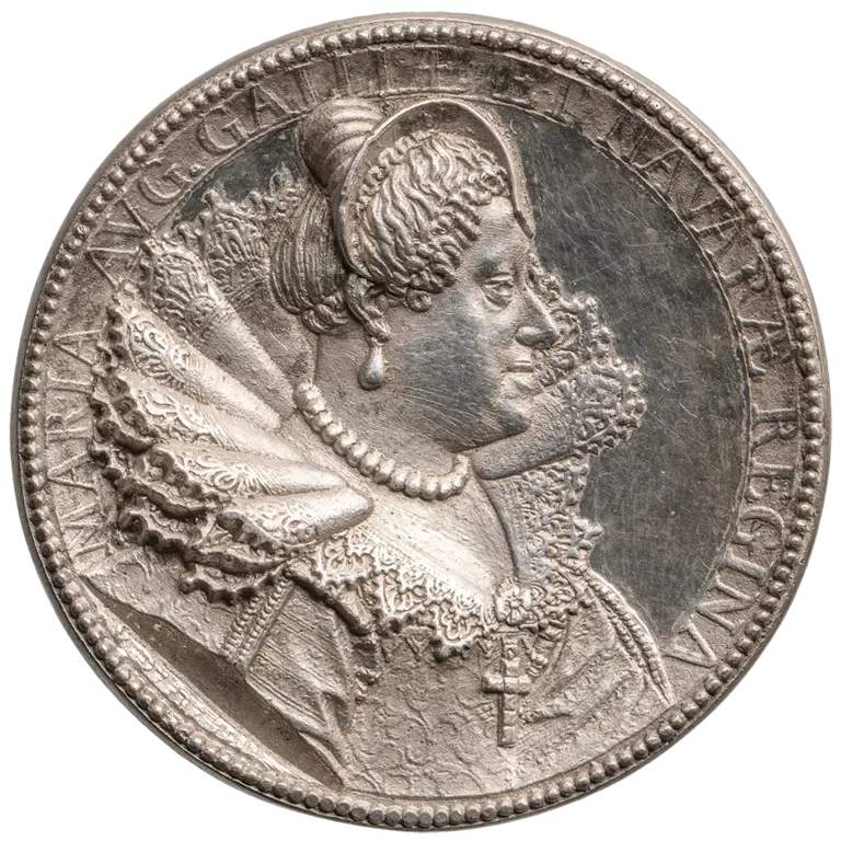 A detailed silver coin featuring a profile of a regal woman adorned with a lace collar and a pearl necklace. The inscription around her reads