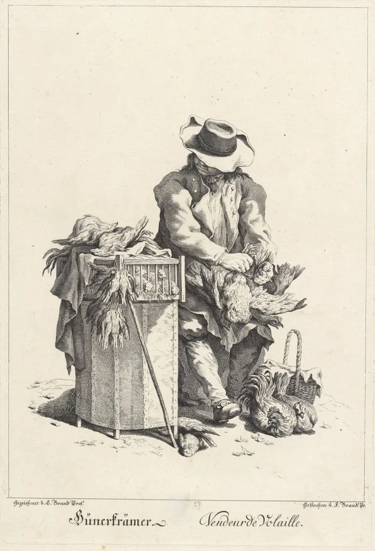 A man dressed in traditional clothing sits at a wooden crate, working with a bunch of fibers or plants. He is focused on his task, with a basket nearby containing similar materials. The setting appears to be rustic, reflecting a bygone era.