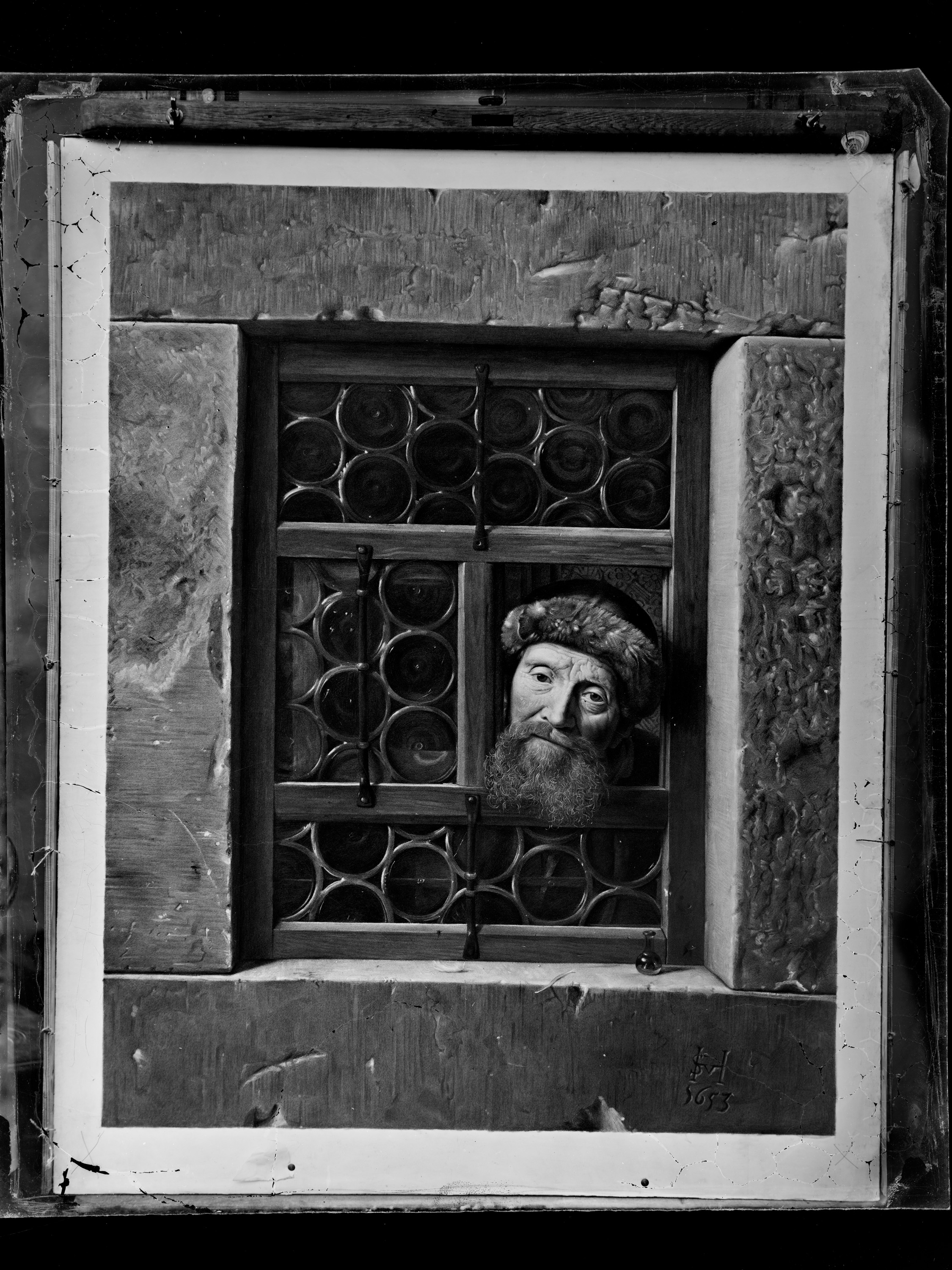 Alter Mann im Fenster