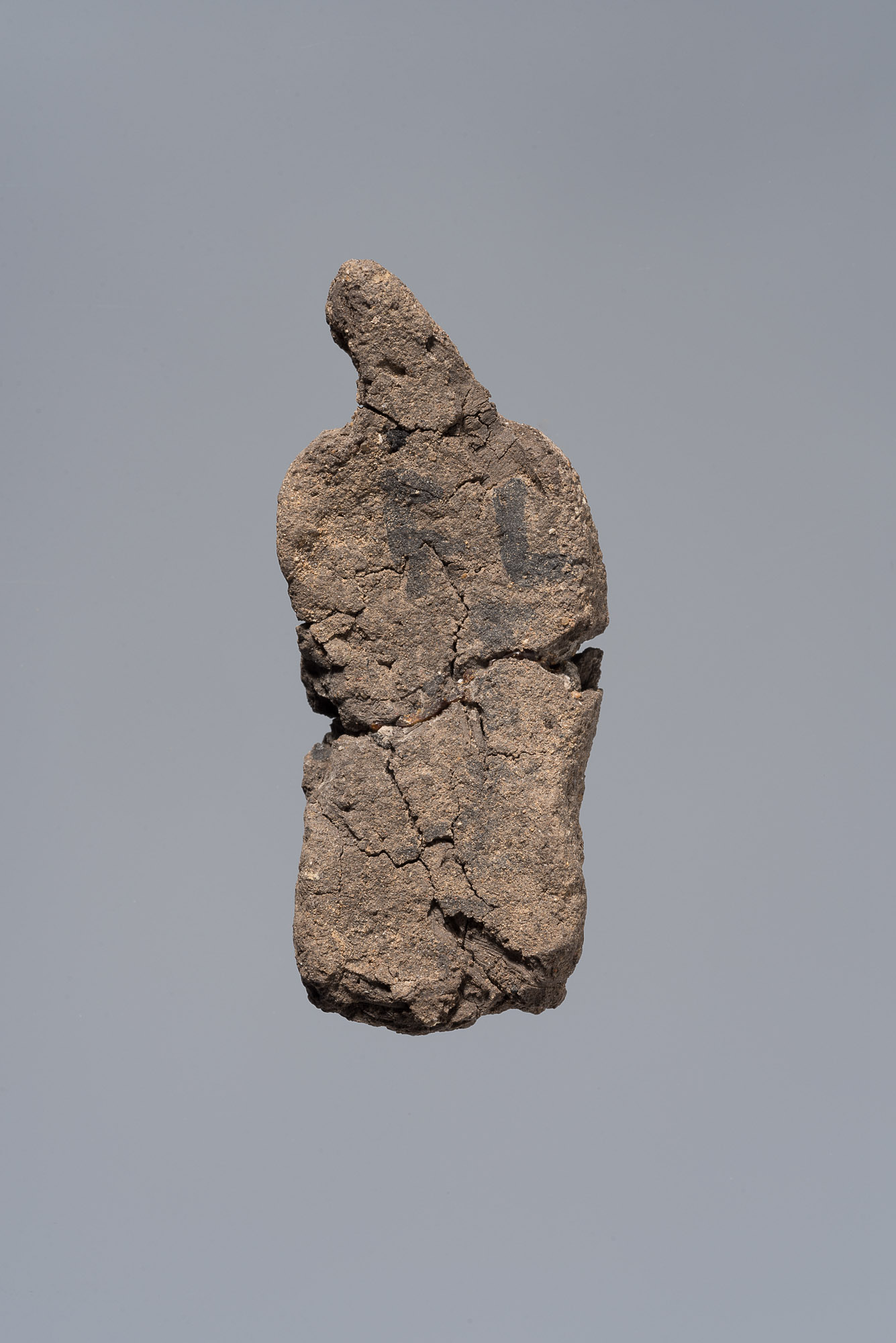 Ächtungsfigur mit Aufschrift