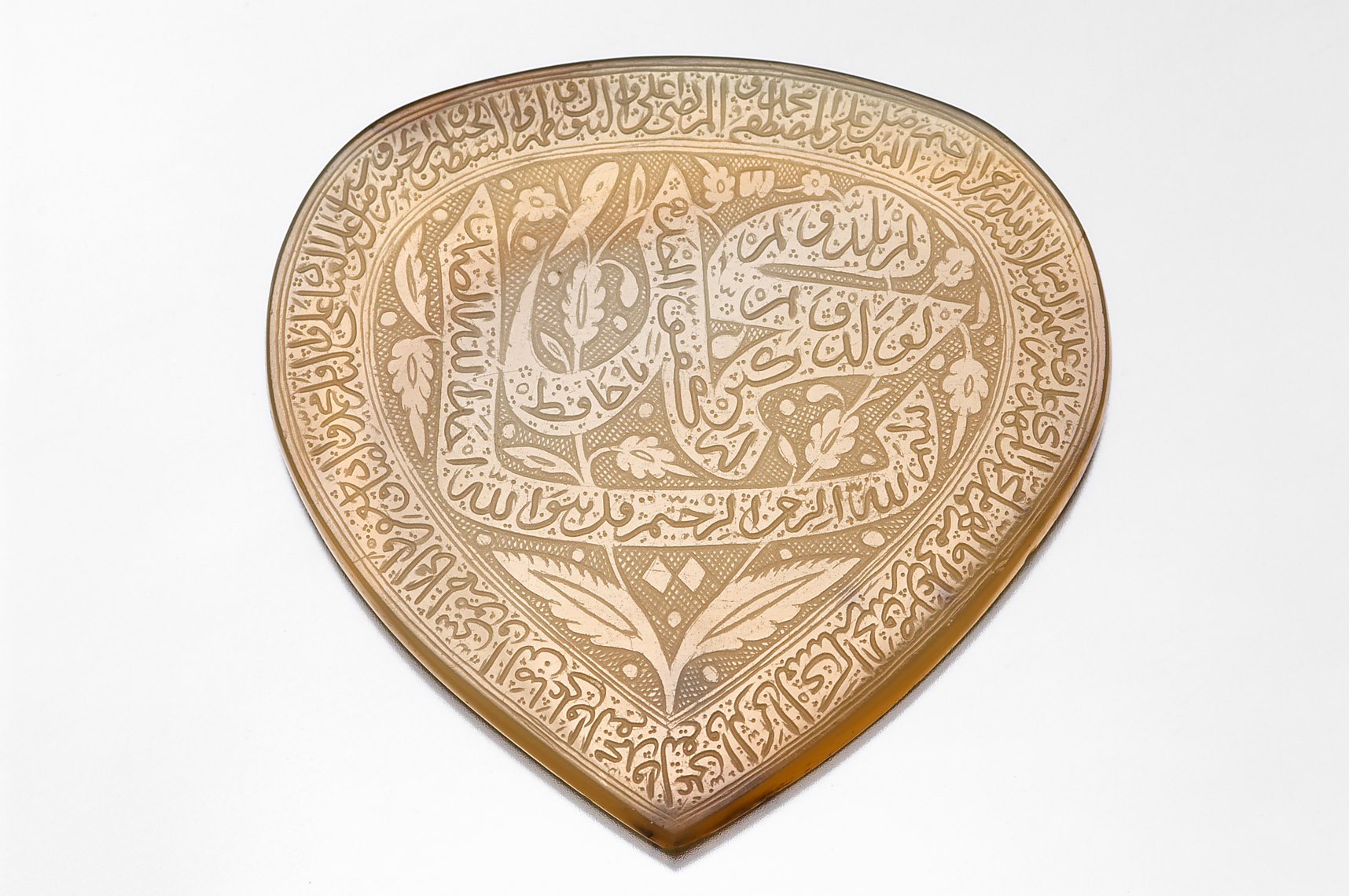 Herzförmiger Talisman mit Sure