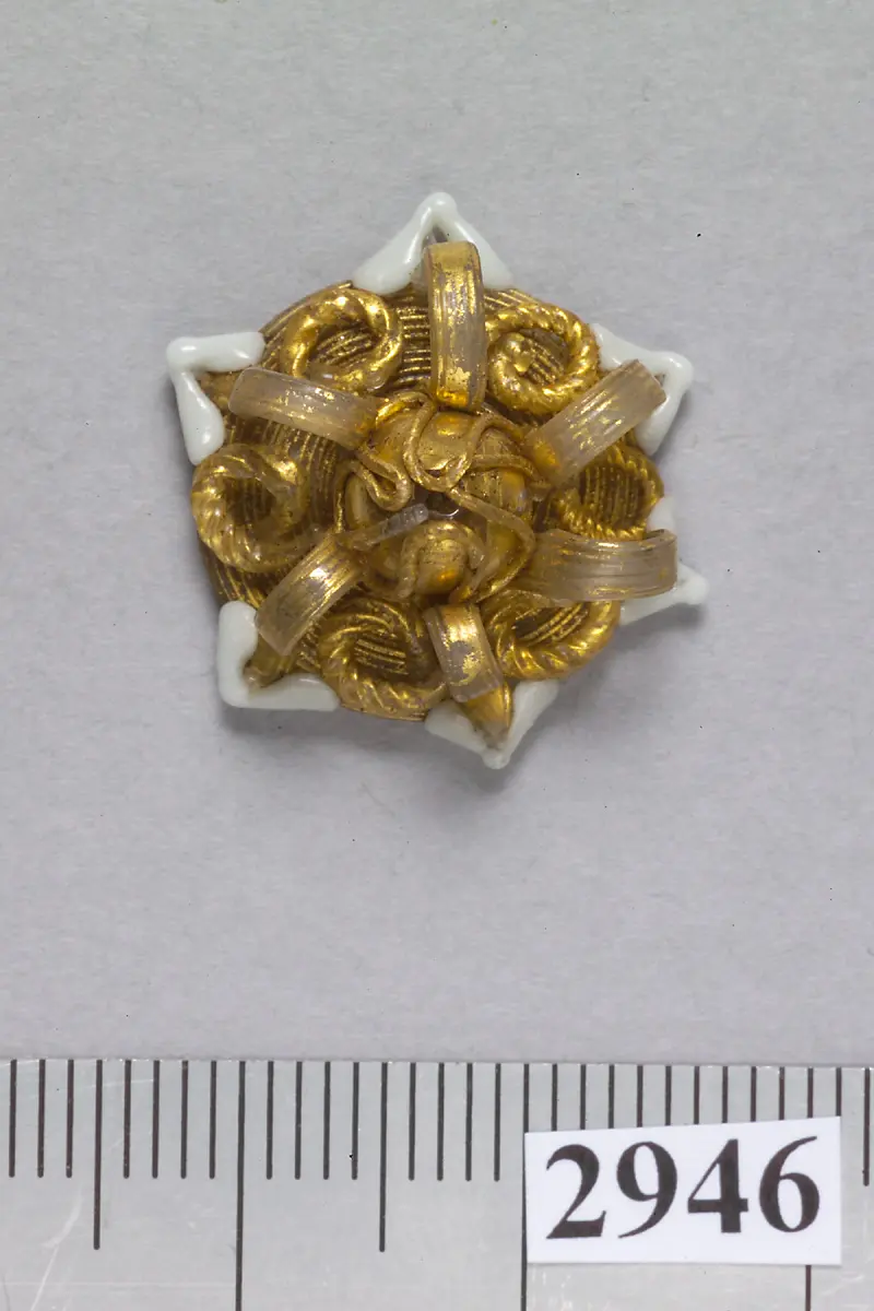 sechsstrahliger sternförmiger Knopf aus Glas