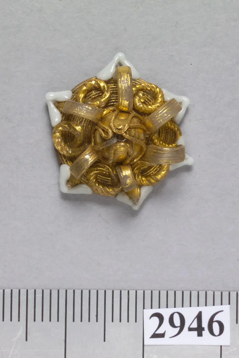 sechsstrahliger sternförmiger Knopf aus Glas