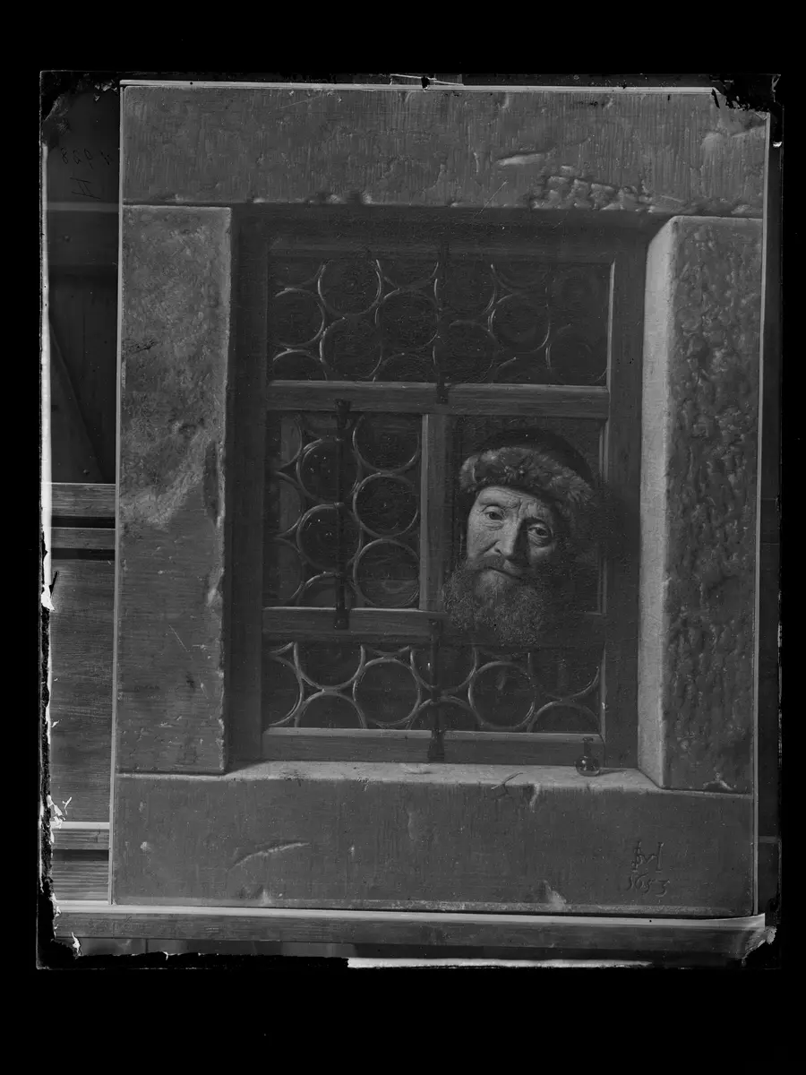 Alter Mann im Fenster