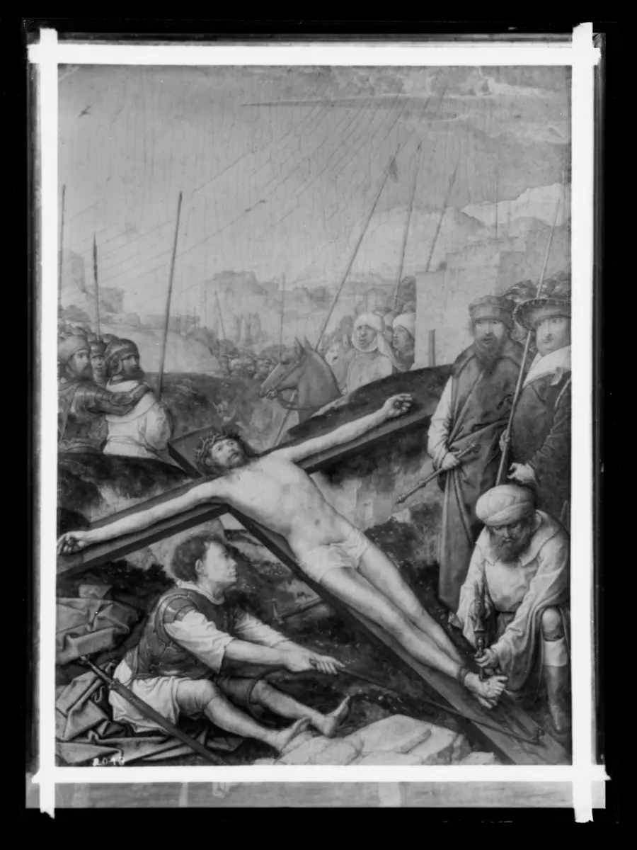 Christus wird ans Kreuz genagelt