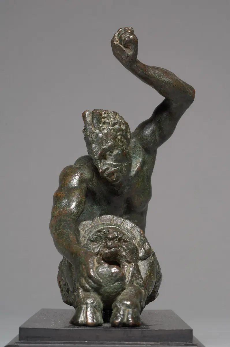 Öllampe (?) in Gestalt eines sitzenden Satyrs mit Maskeron
