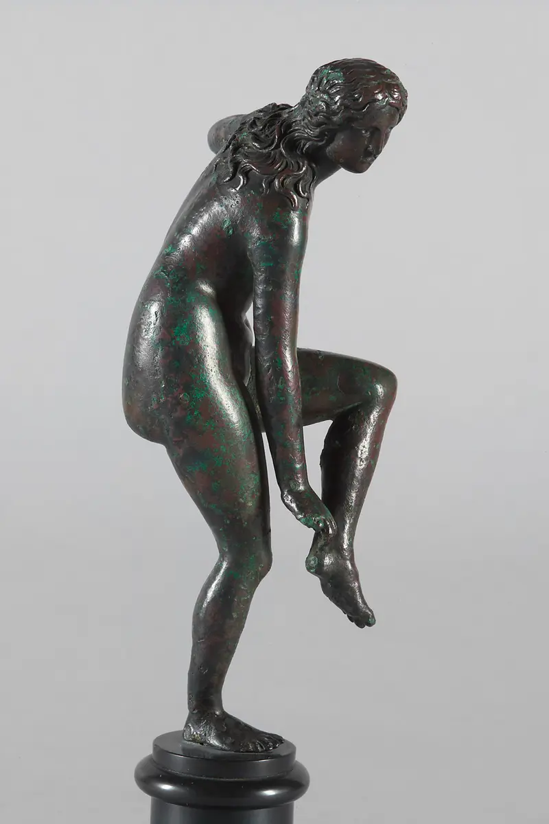 Sandalenlösende Venus