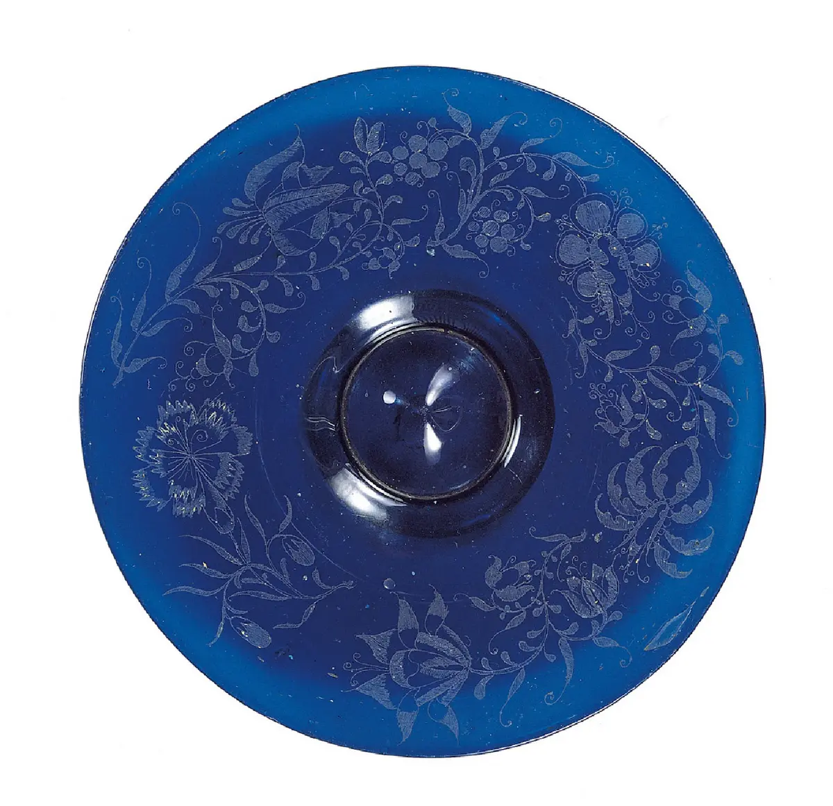 Blauer Teller mit diamantgraviertem Blumendekor