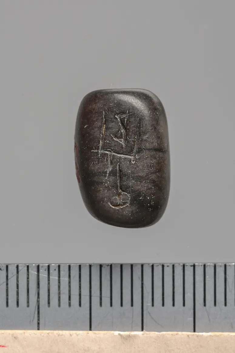 Siegelamulett, längs durchbohrt