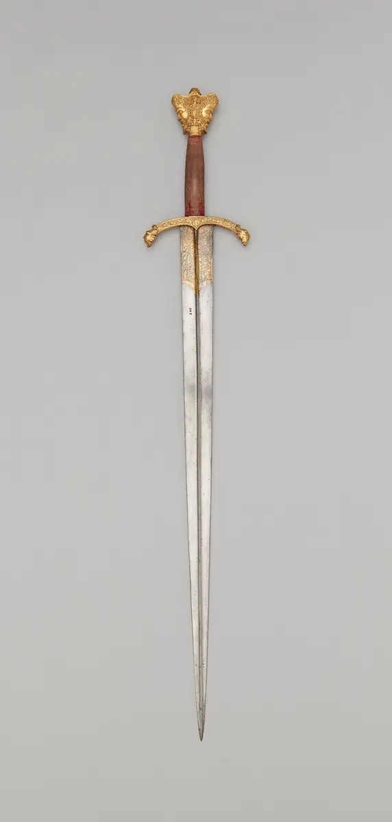 Schwert mit Krauf in Form eines Januskopfes