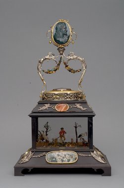 Automat mit Gartenlandschaft und Uhr