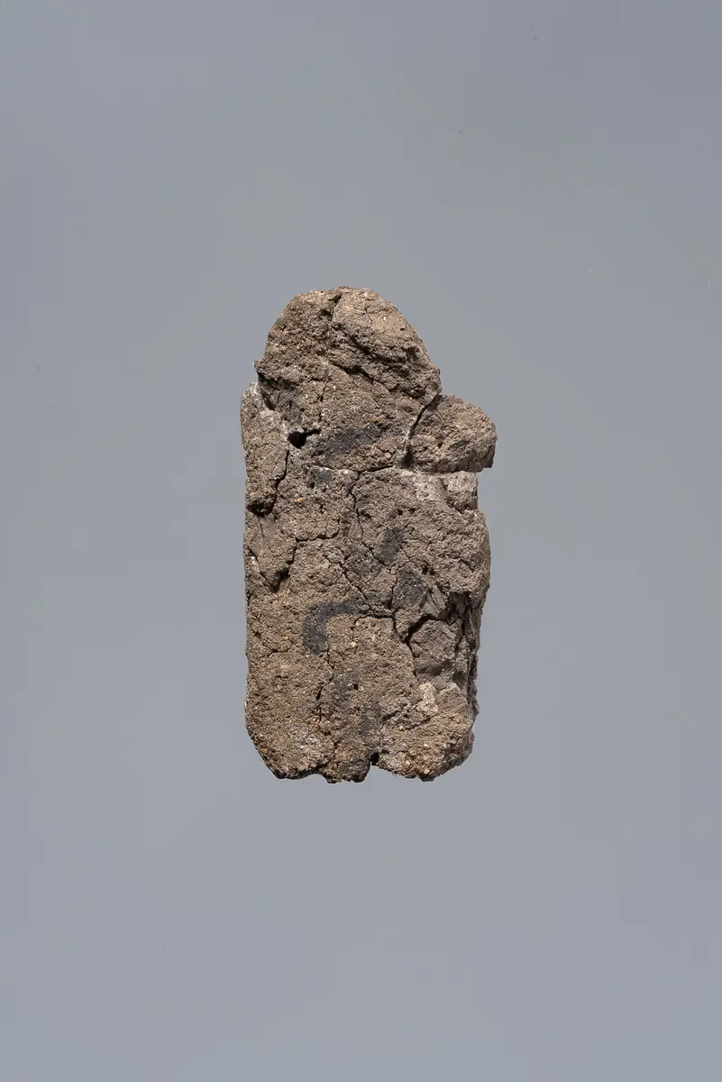 Ächtungsfigur mit Aufschrift