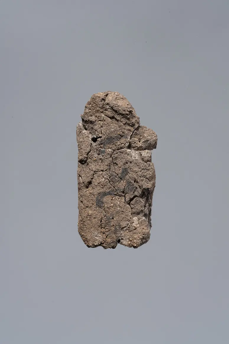 Ächtungsfigur mit Aufschrift