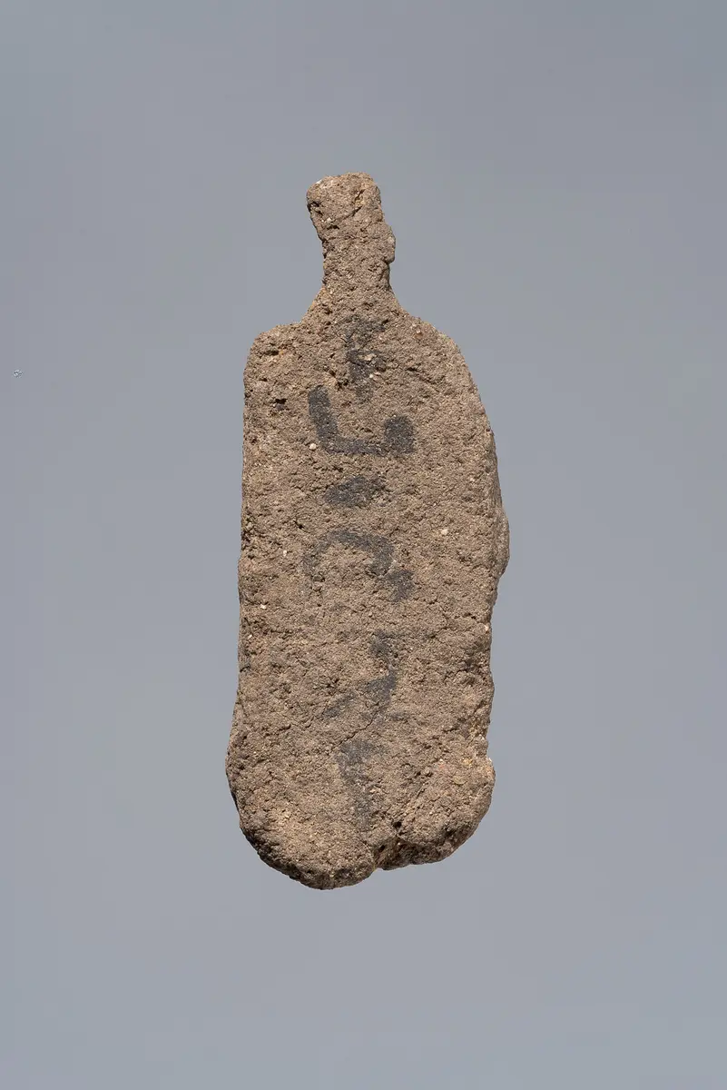 Ächtungsfigur mit Aufschrift