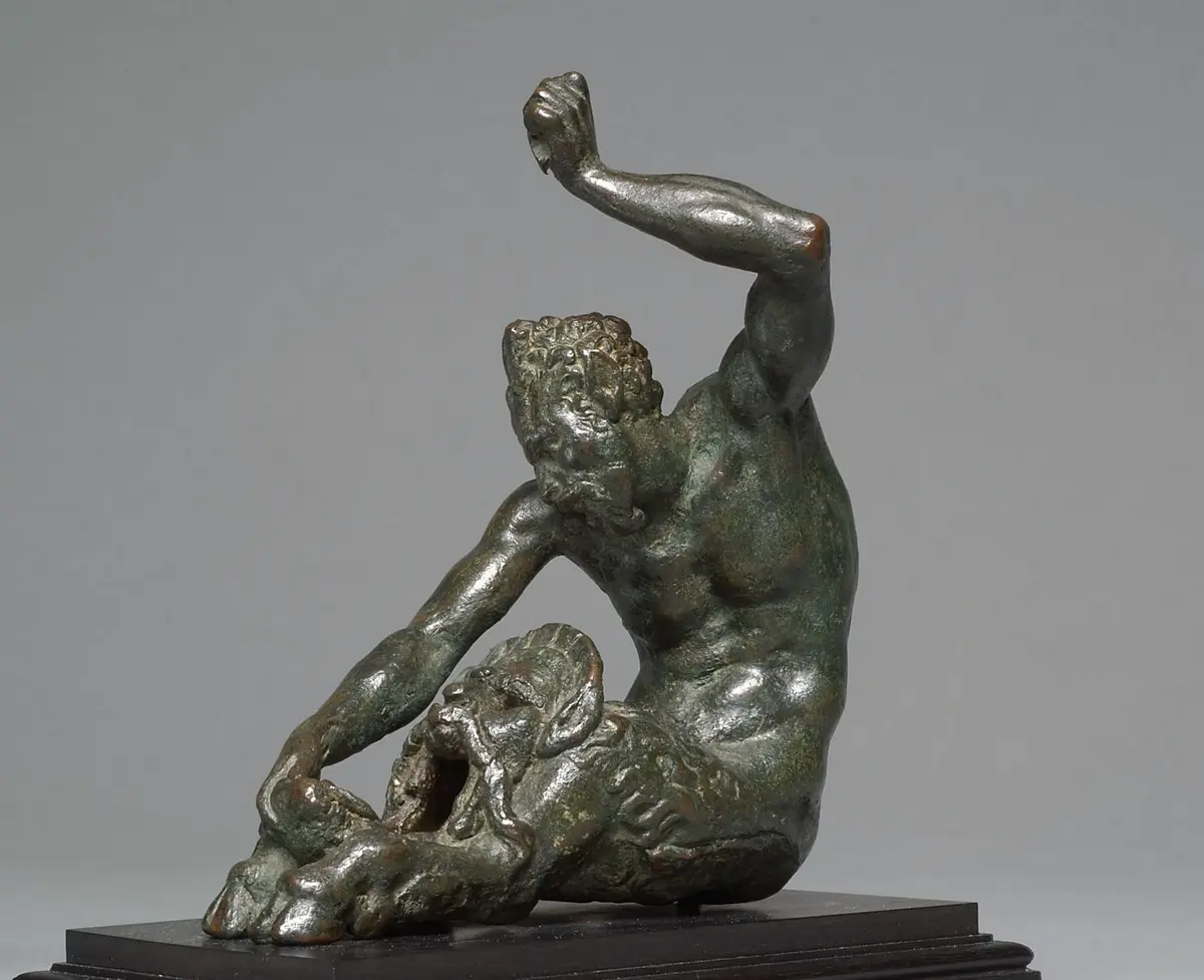Öllampe (?) in Gestalt eines sitzenden Satyrs mit Maskeron