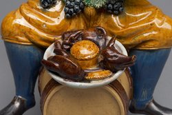Gefäß; Statuette, Tongefäß, Scherzfigur, Prasser