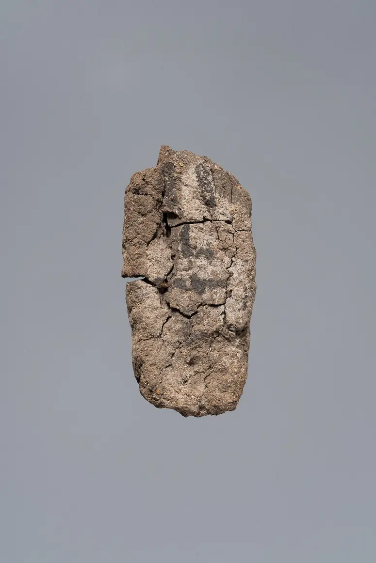 Ächtungsfigur mit Aufschrift