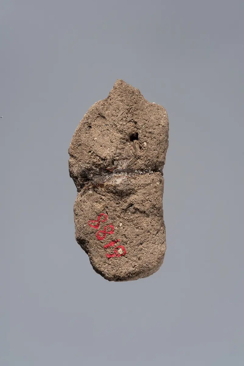 Ächtungsfigur mit Aufschrift