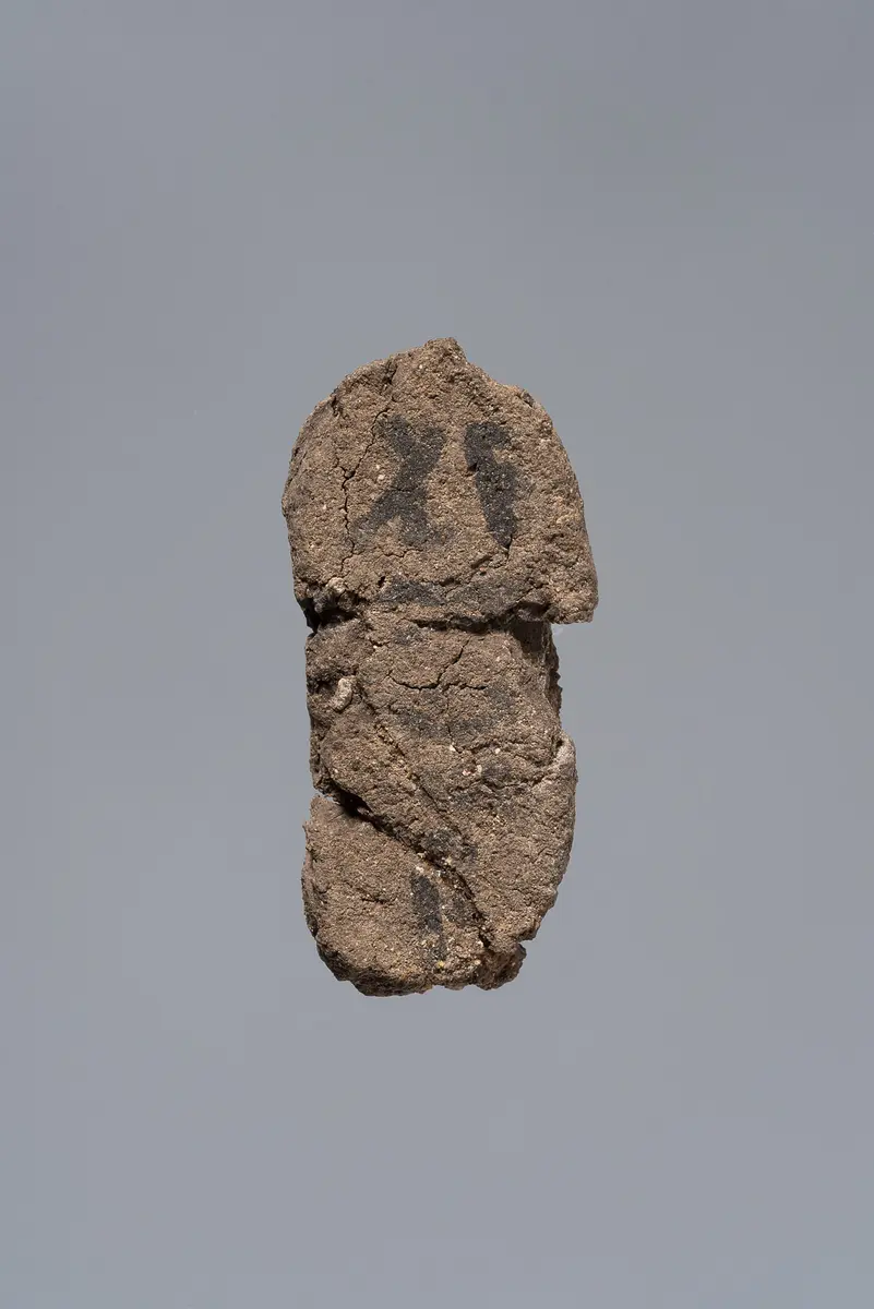 Ächtungsfigur mit Aufschrift
