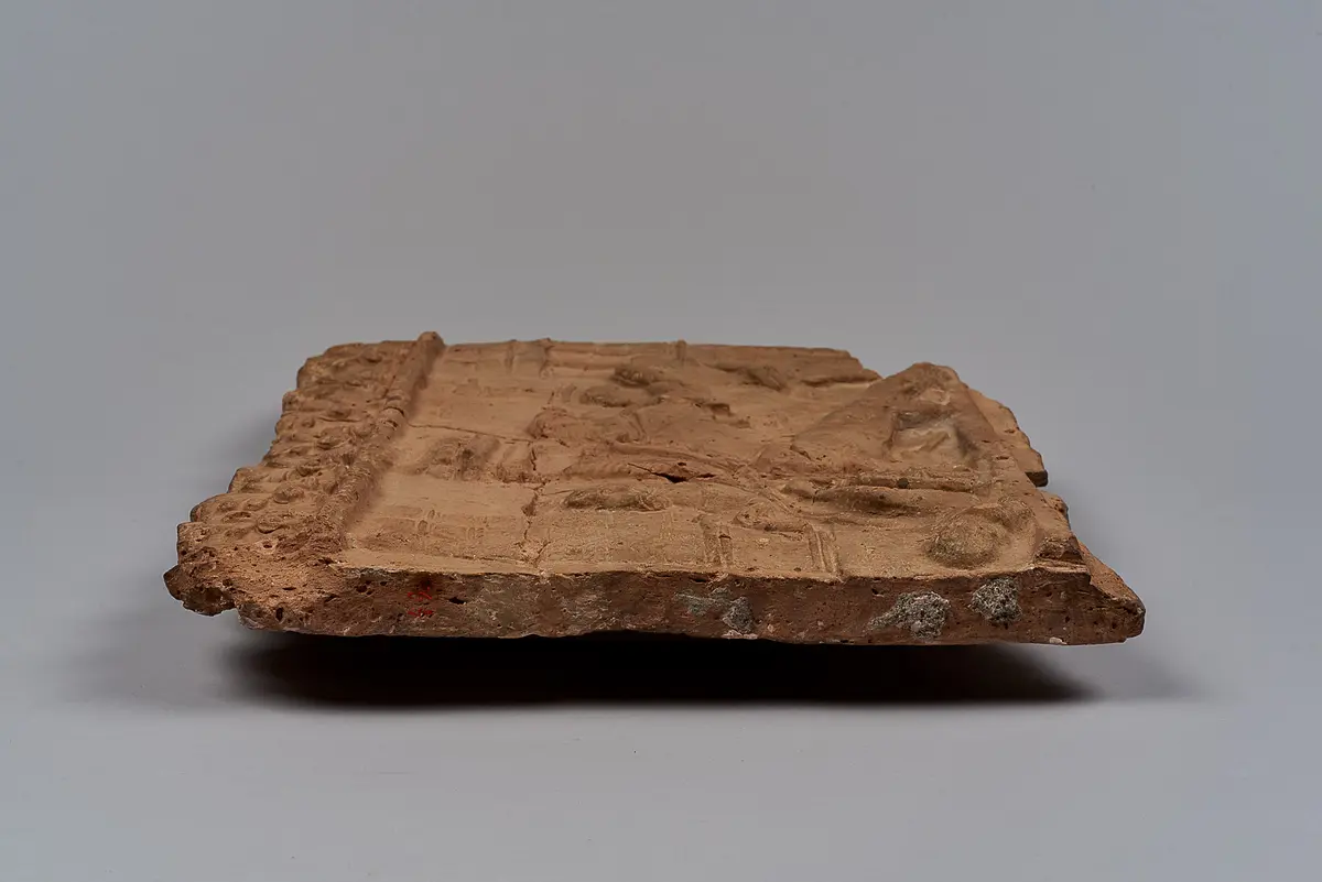 Aufsatzplatte: Unfall beim Wagenrennen