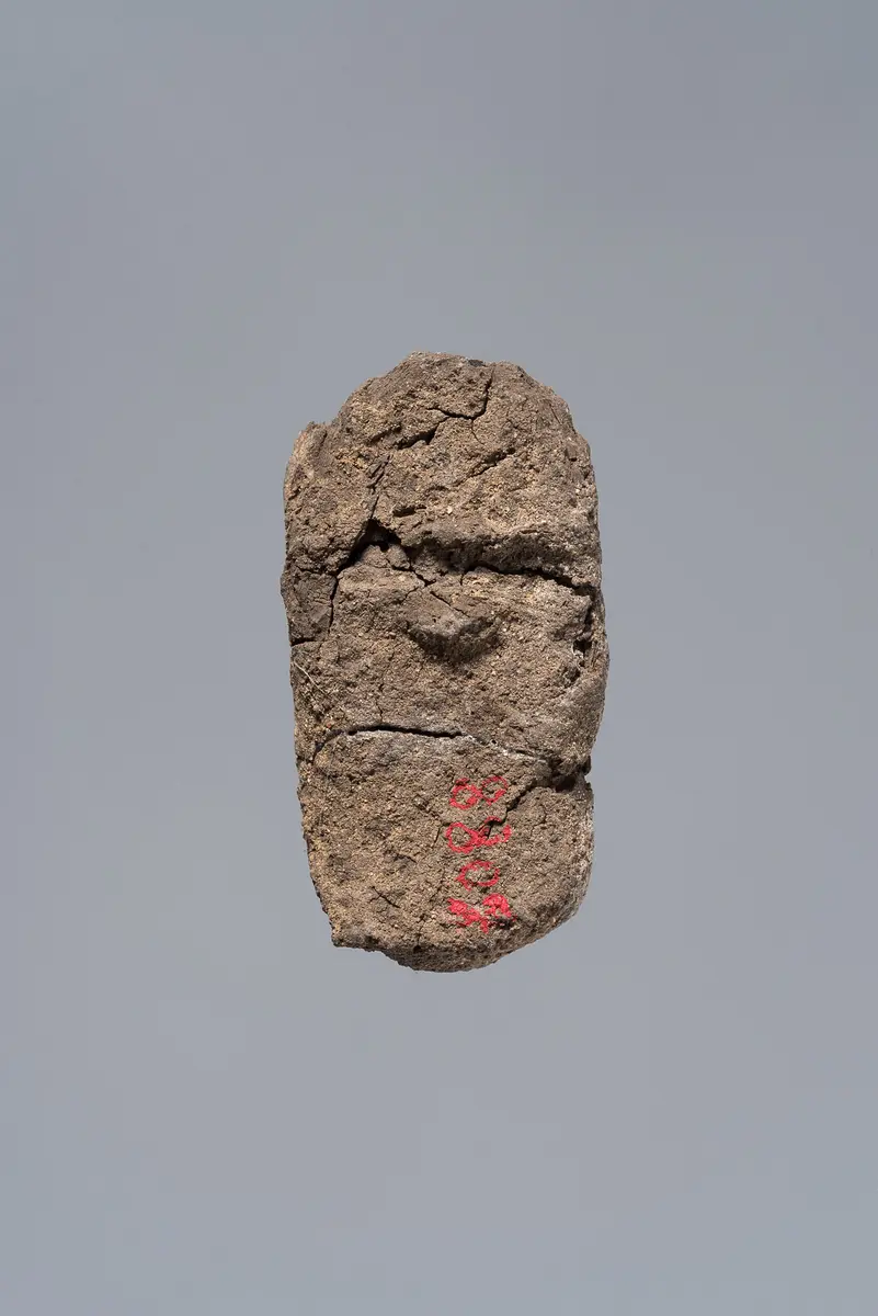 Ächtungsfigur mit Aufschrift