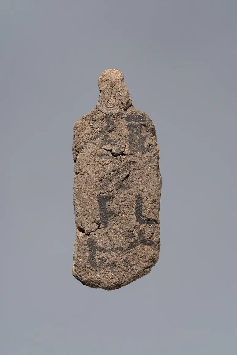 Ächtungsfigur mit Aufschrift