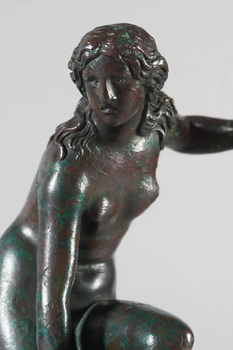Sandalenlösende Venus