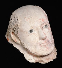 Kopf vom Stucksarg eines Mannes