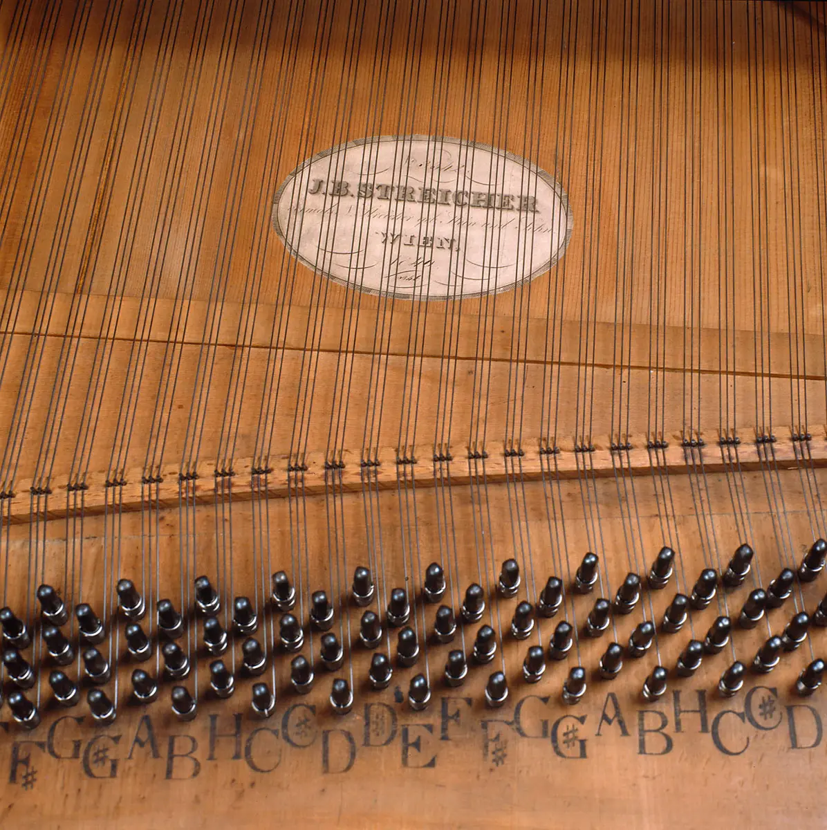 Fortepiano with a down-striking action