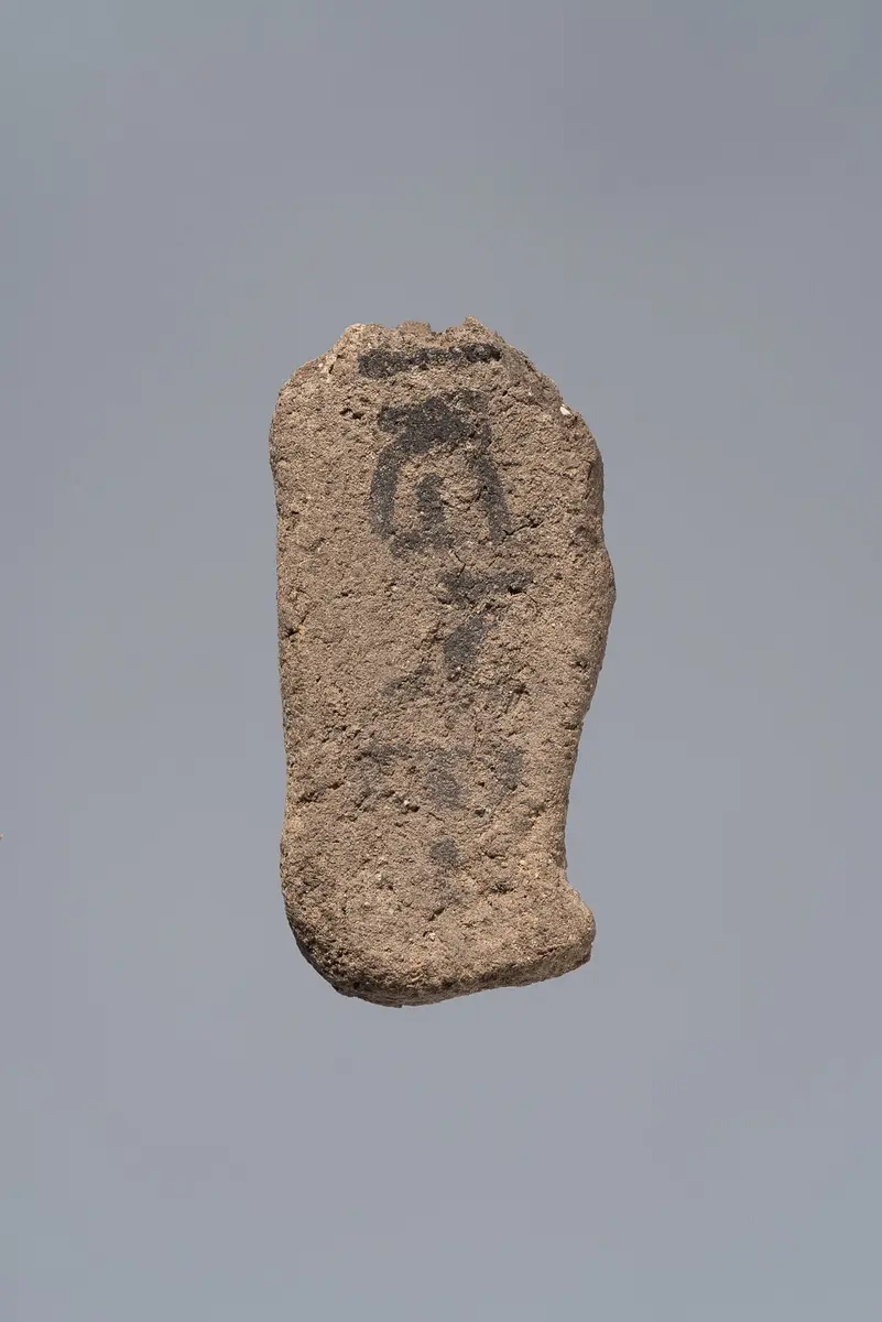 Ächtungsfigur mit Aufschrift