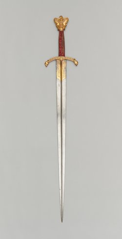 Schwert mit Krauf in Form eines Januskopfes