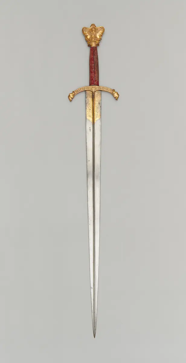 Schwert mit Krauf in Form eines Januskopfes