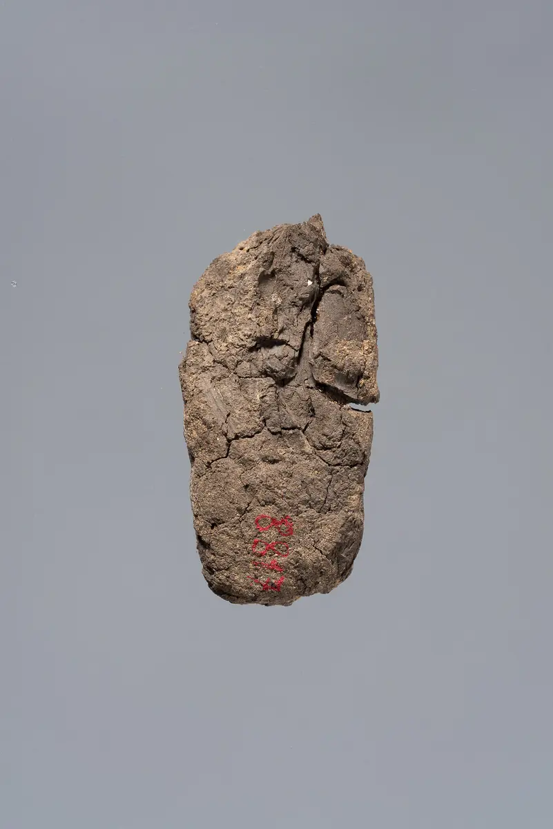 Ächtungsfigur mit Aufschrift
