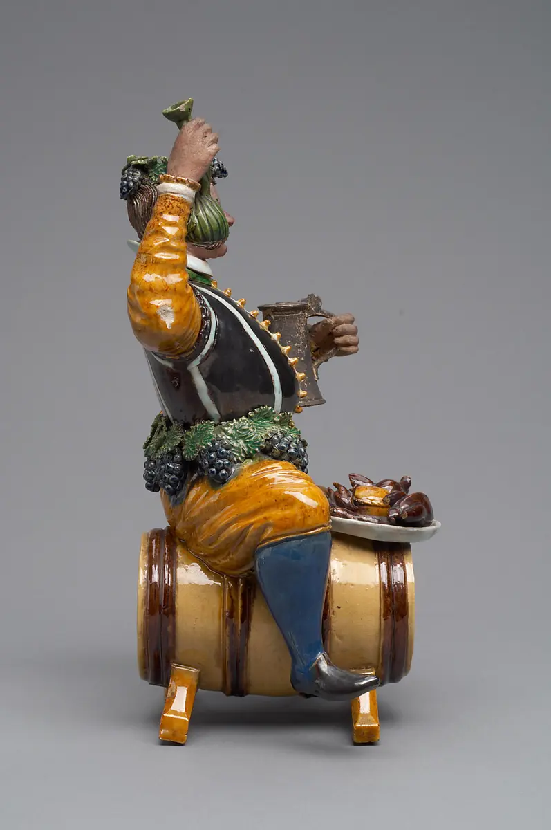 Gefäß; Statuette, Tongefäß, Scherzfigur, Prasser
