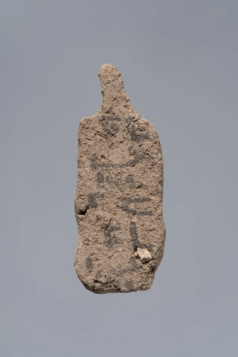 Ächtungsfigur mit Aufschrift