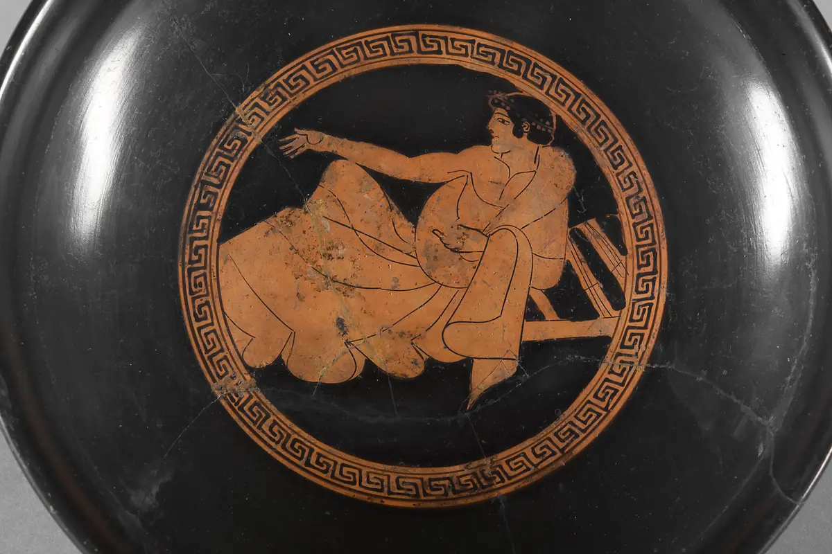 Jüngling beim Gelage