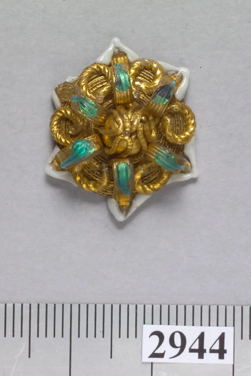 sechsstrahliger sternförmiger Knopf aus Glas