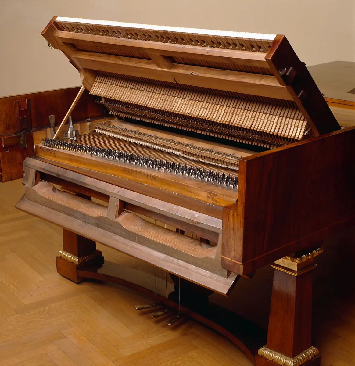 Fortepiano with a down-striking action