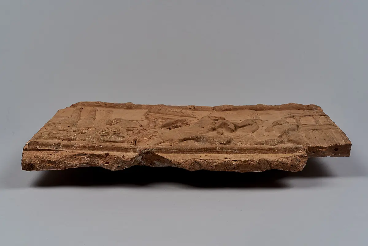 Aufsatzplatte: Unfall beim Wagenrennen