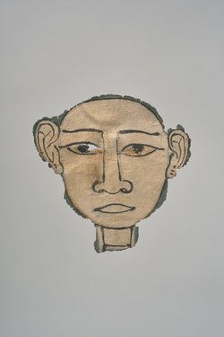 Gesicht aus einer Mumienkartonage
