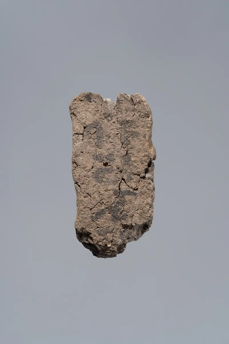 Ächtungsfigur mit Aufschrift