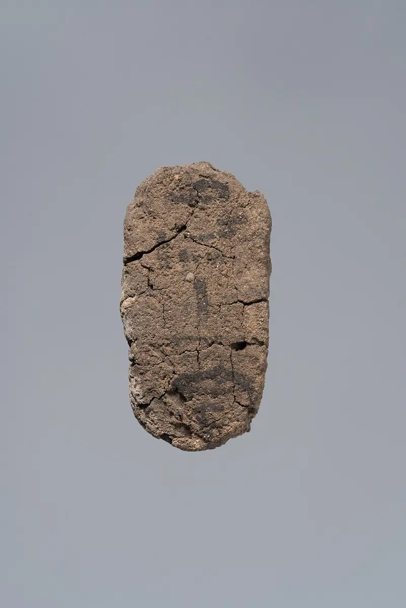 Ächtungsfigur mit Aufschrift