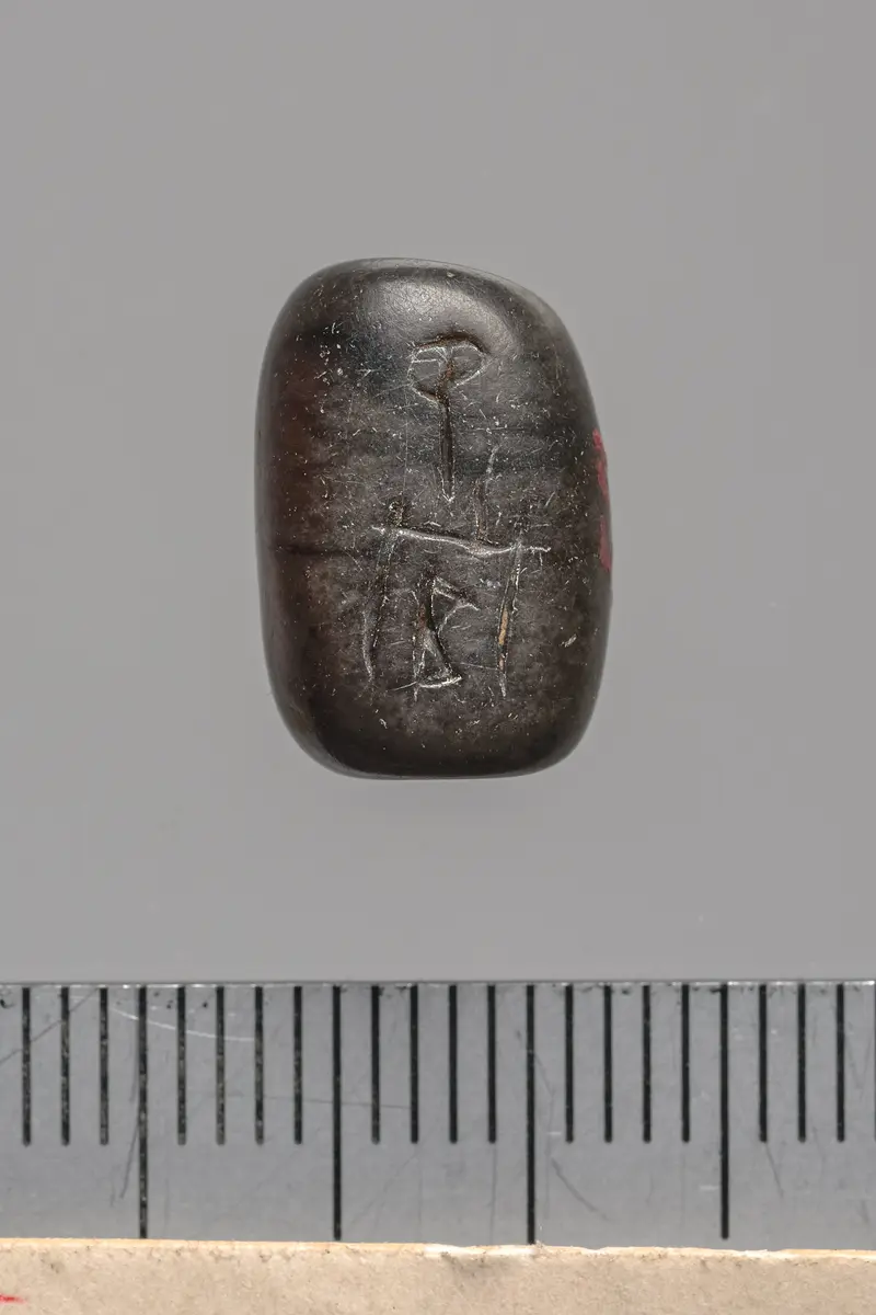 Siegelamulett, längs durchbohrt