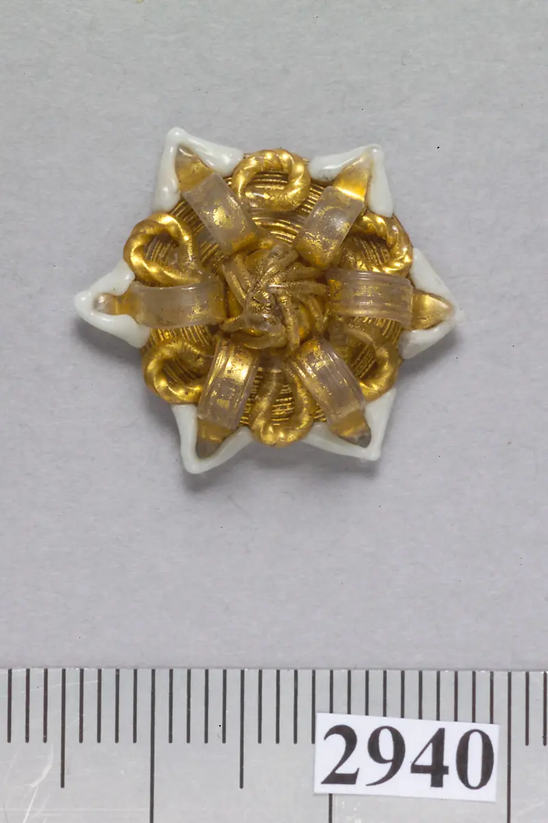 sechsstrahliger sternförmiger Knopf aus Glas