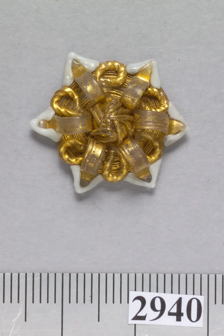 sechsstrahliger sternförmiger Knopf aus Glas