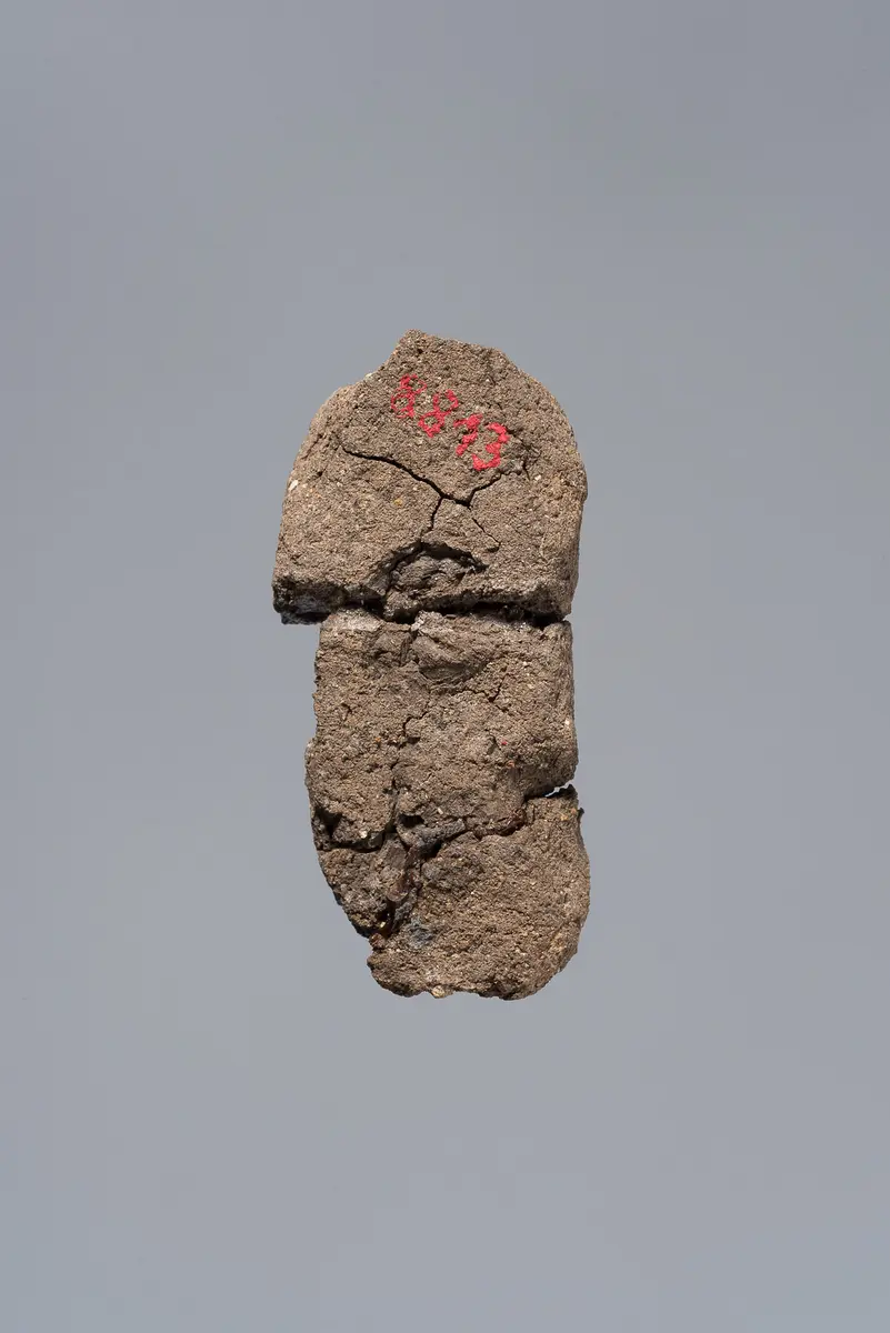 Ächtungsfigur mit Aufschrift