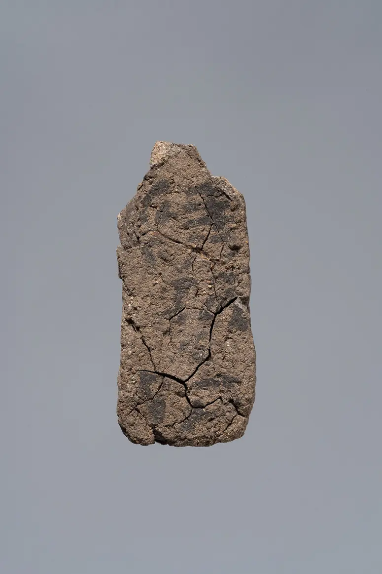 Ächtungsfigur mit Aufschrift